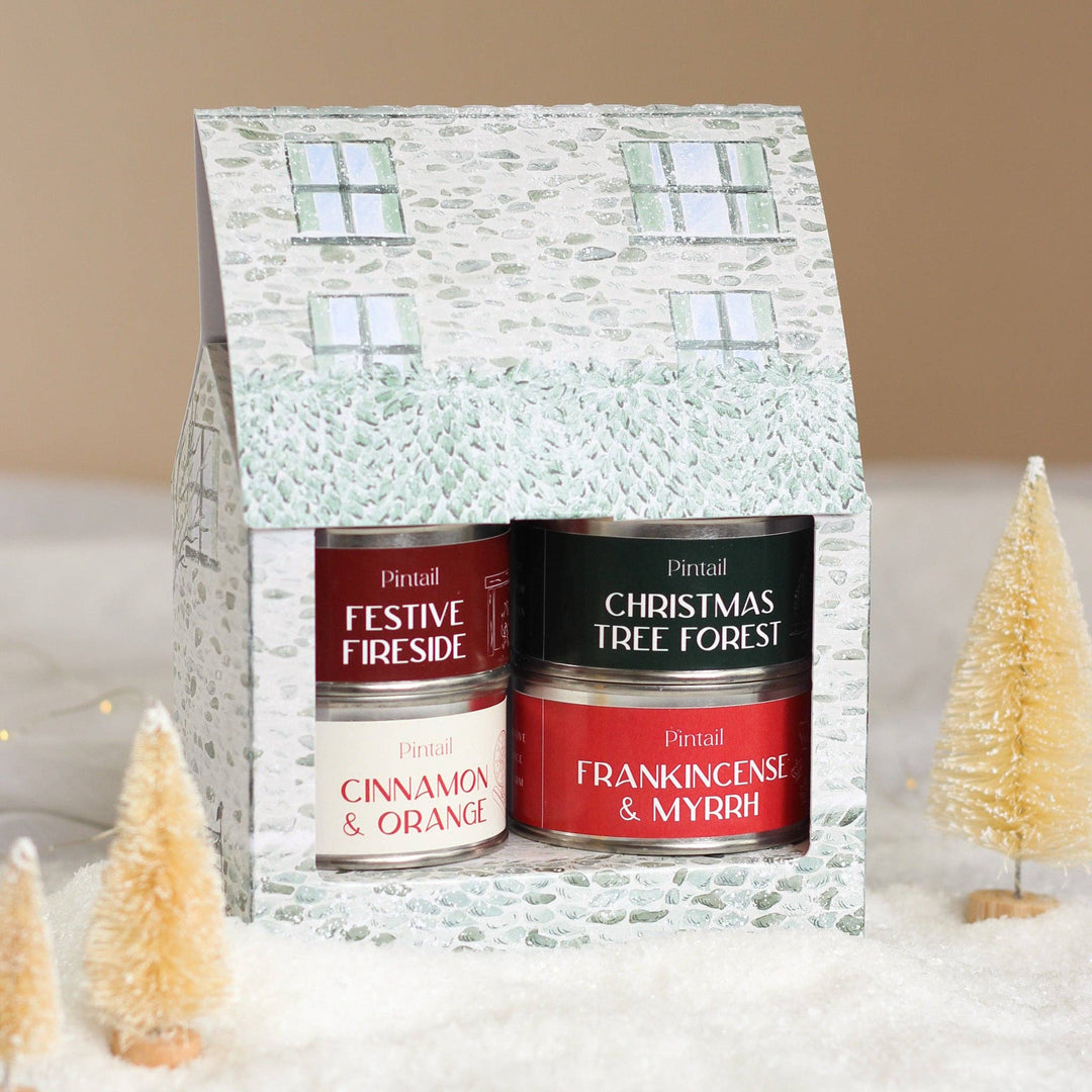 Pintail Candles Holiday Cottage Gift Set with festive scents of Orange and Cinnamon, Festive Fireside, Frankincense and Myrrh, and Christmas Tree Forest.