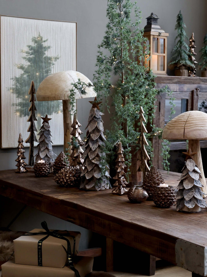 rustic table display with wooden trees and mocha acorns