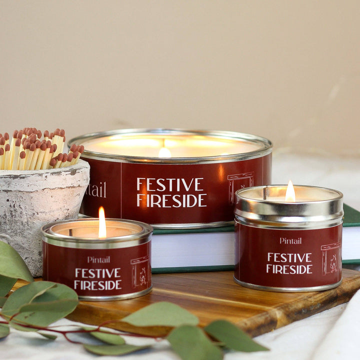 Pintail Candles Festive Fireside Triple Wick Candle with rich, smoky notes, saffron, and spice. Coziness with a 15-hour burn time.