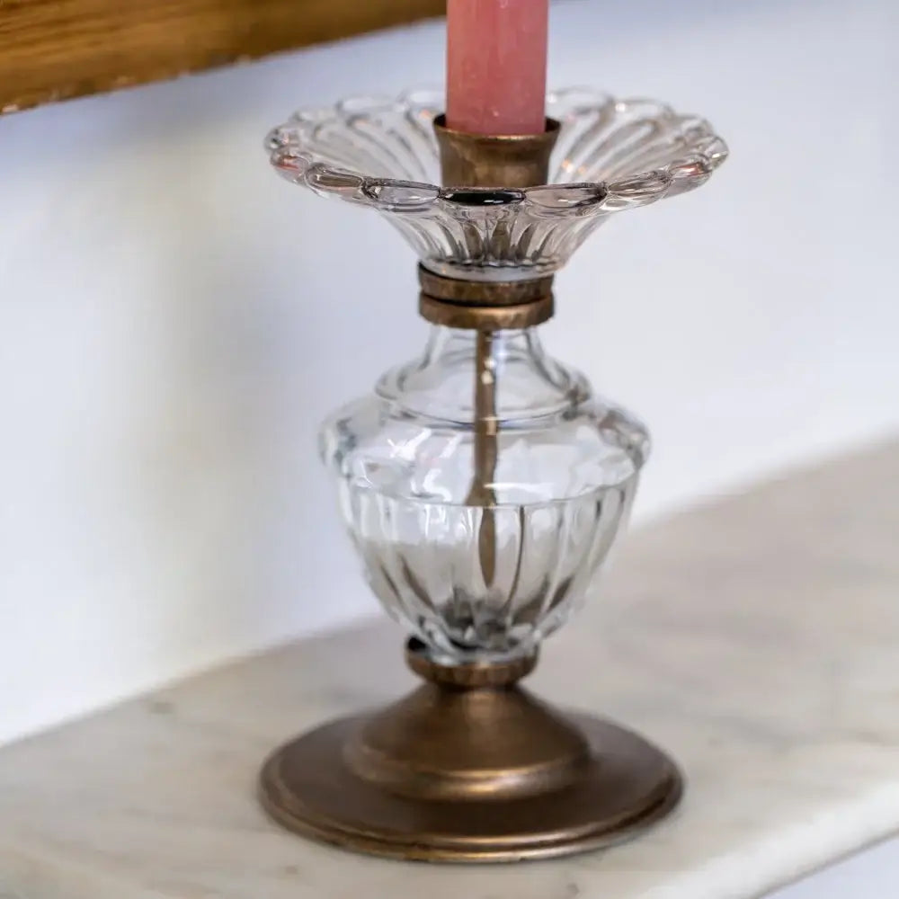 Antique glass and gold candle holder with vintage faux old gold finish, adding a touch of elegance to home decor.