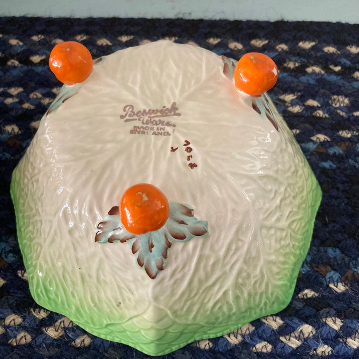 Bottom view of a vintage Beswickware Lettuce Leaf Bowl with decorative tomato accents, sourced from Source for the Goose, Devon.