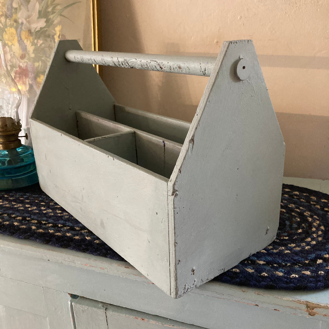 Vintage blue painted caddy from Source for the Goose, Devon. Rustic toolbox for storage and organization.