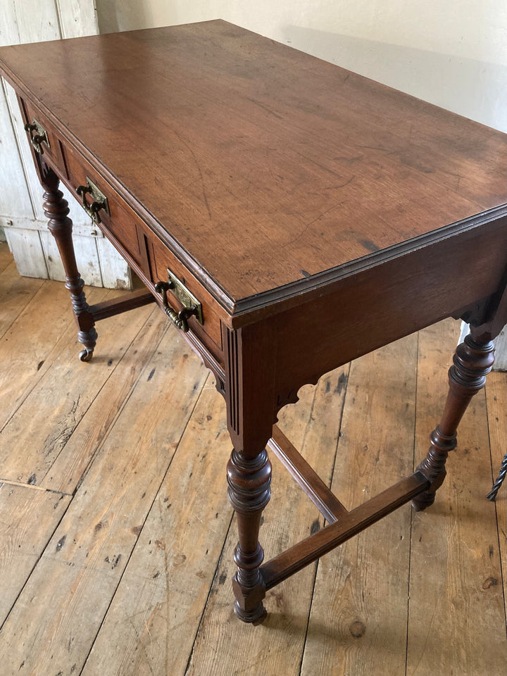 Antique Oak Console Table by JAS Shoolbred with three drawers and brass handles, from Source for the Goose, Devon.