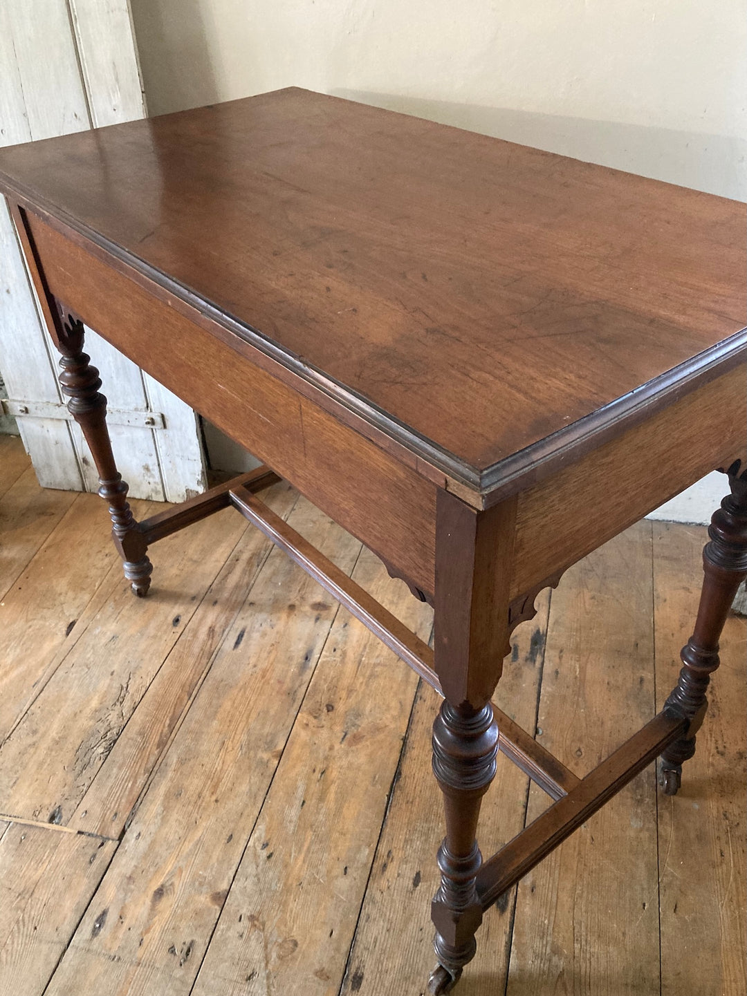 Antique Oak Console Table by JAS Shoolbred featuring intricate carvings and brass handles, sourced from Devon.