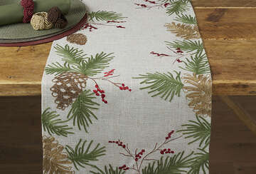 Embroidered Pine Cone Table Runner with festive design, perfect for Christmas decor, from Source for the Goose Devon.