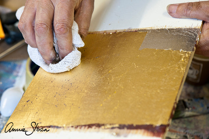 Applying Imitation Gold Loose Leaf to wood with cloth, Source for the Goose Devon.