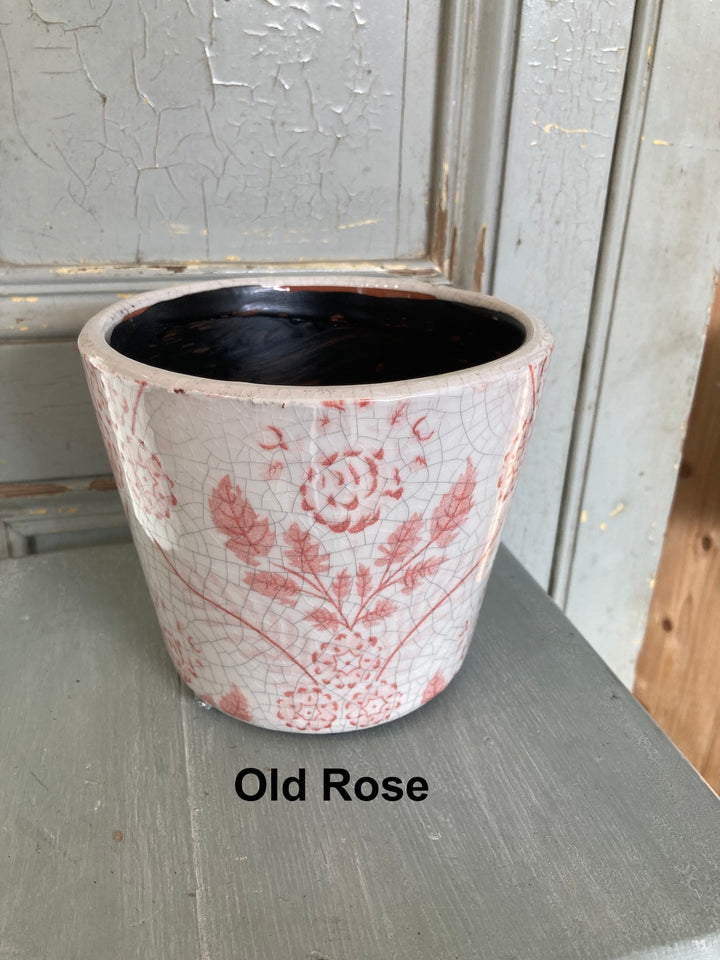 Handcrafted Old Rose flowerpot with floral design, perfect for adding vintage charm to your home decor.