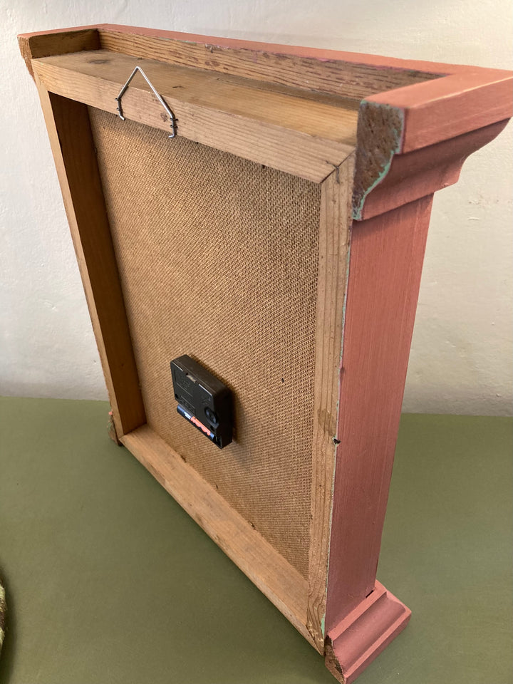 Back view of Country Style Painted Wall Clock showcasing wooden frame and battery compartment, designed by Source for the Goose.