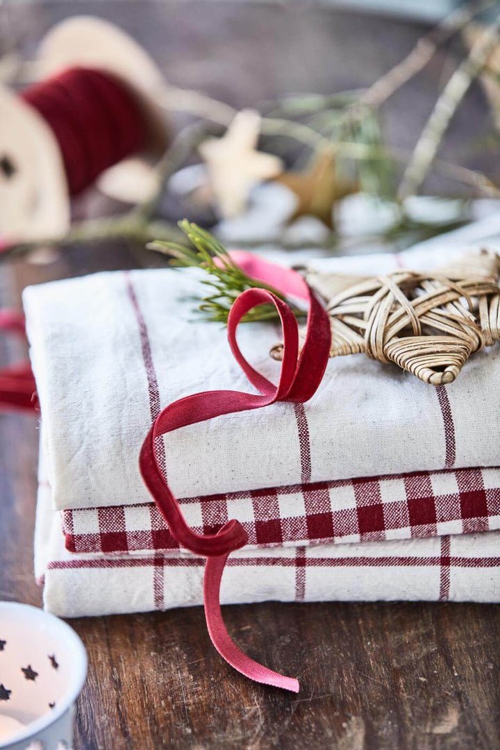 selection of red and white tea towels