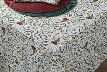 Festive Robin & Mistletoe Tablecloth on white table, ideal for Christmas, by Source for the Goose, Devon.