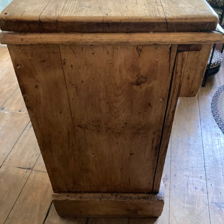 Side view of rustic antique pine sideboard showing sturdy construction and natural wood grain from Source for the Goose, Devon.