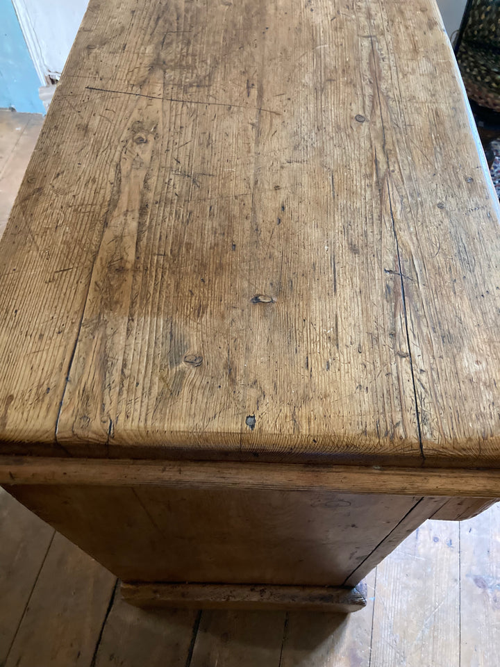 Rustic antique pine sideboard top showcasing natural wood grain, perfect for adding country charm to any space. Source for the Goose Devon.