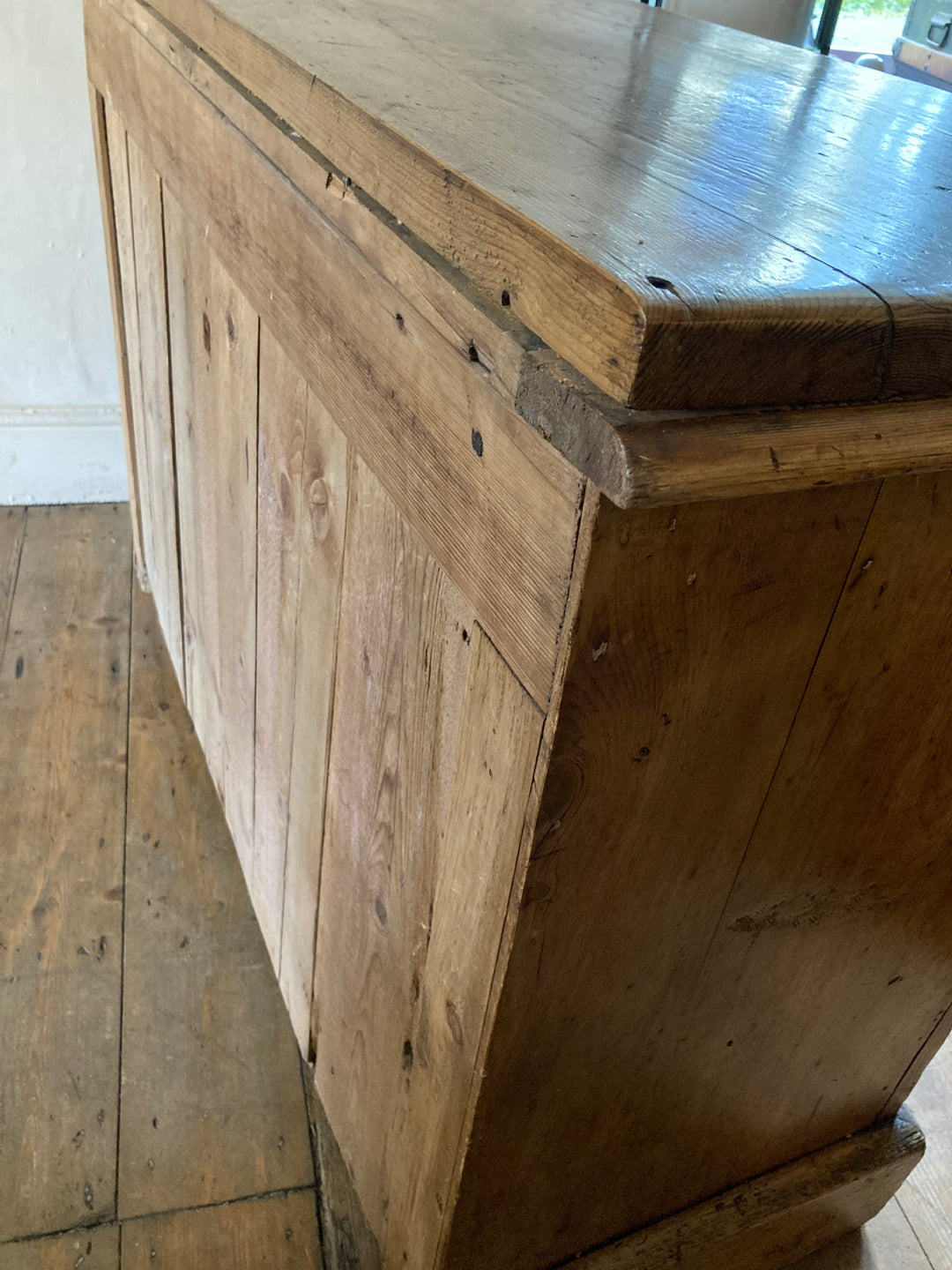 Rustic antique pine sideboard with sturdy wooden construction and charming country appeal, by Source for the Goose, Devon.