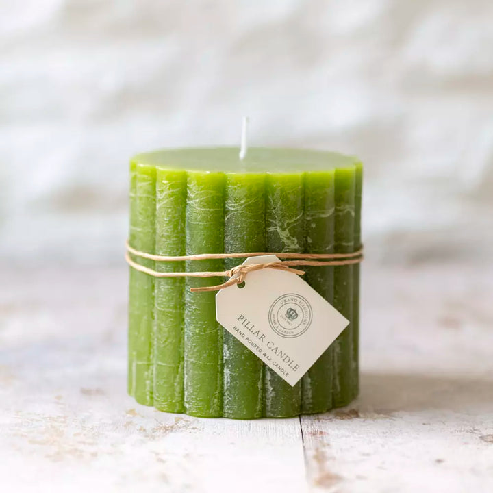 Rustic fern green scalloped pillar candle from Source for the Goose, Devon, showcasing unique textured design.