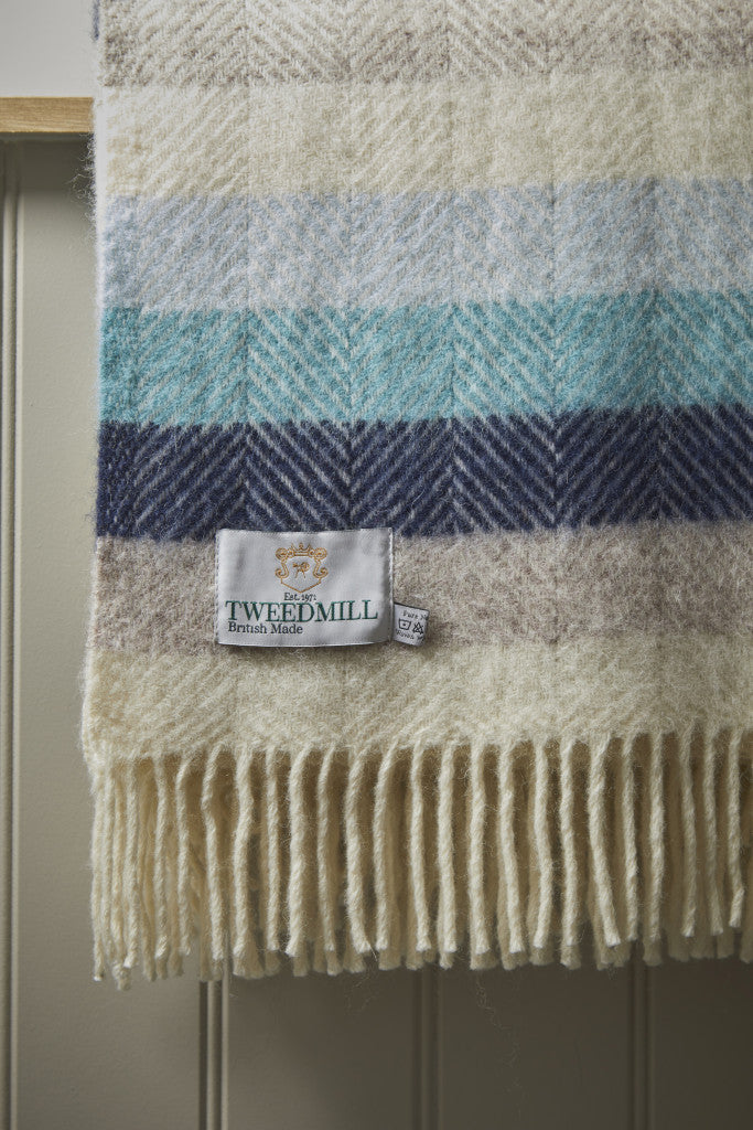 Tweedmill Seashore Blue Stripe Pure Wool Throw with cream fringe, featuring herringbone seashore stripe design, available at Source for the Goose Devon.