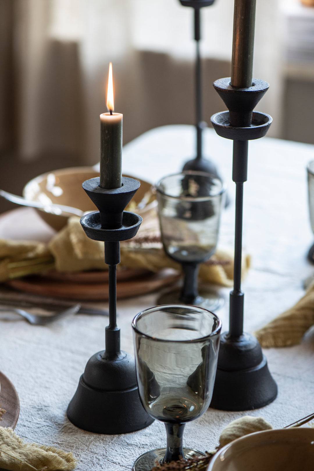 Chunky Black Iron Candlestick on dining table adds industrial style, available at Source for the Goose, Devon.