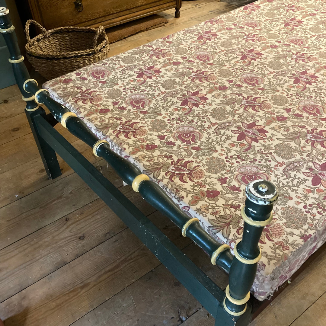 Vintage French green single bed with floral fabric, adding charm to any bedroom, by Source for the Goose, Devon.