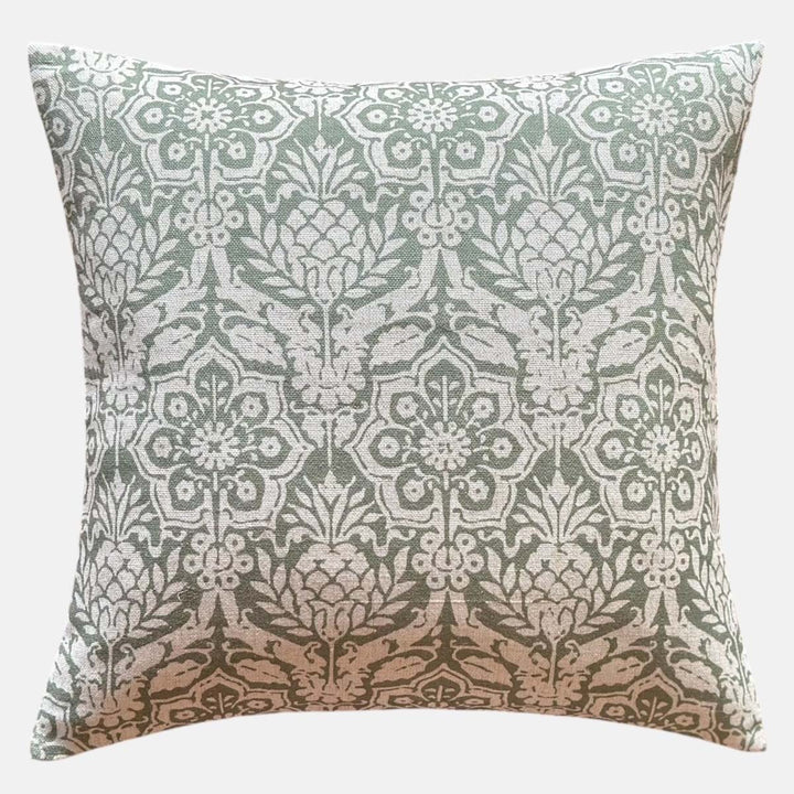 Sage Green Zanzibar Cushion by Source for the Goose, featuring a floral pattern with a muted green/grey color, ideal for elegant decor.