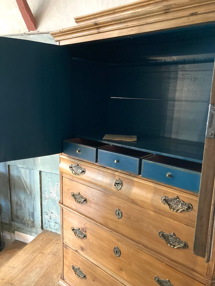 Interior view of Antique Pine French Linen Press with drawers and rustic blue accents, sourced from Source for the Goose, Devon.