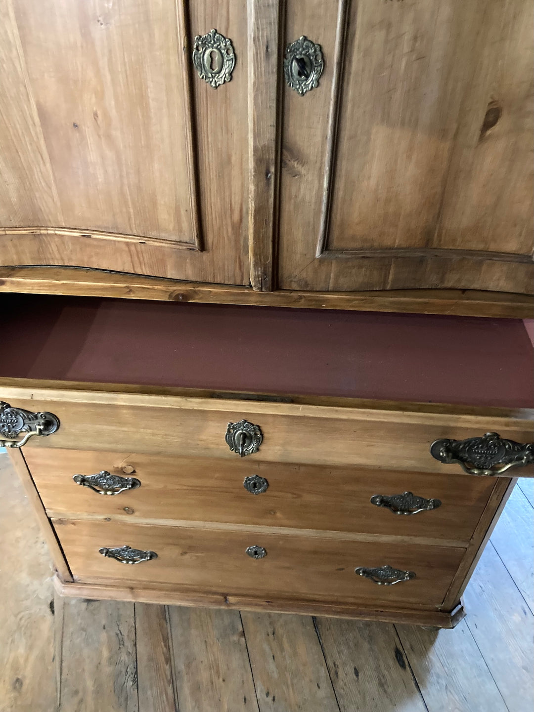 Antique Pine French Linen Press with brass handles and escutcheons, featuring two doors and four drawers for storage.