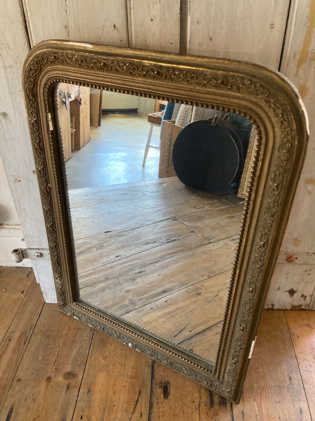 Vintage Arch Top French Mirror with distressed gold frame, featuring floral design and beaded edging from Source for the Goose, Devon.