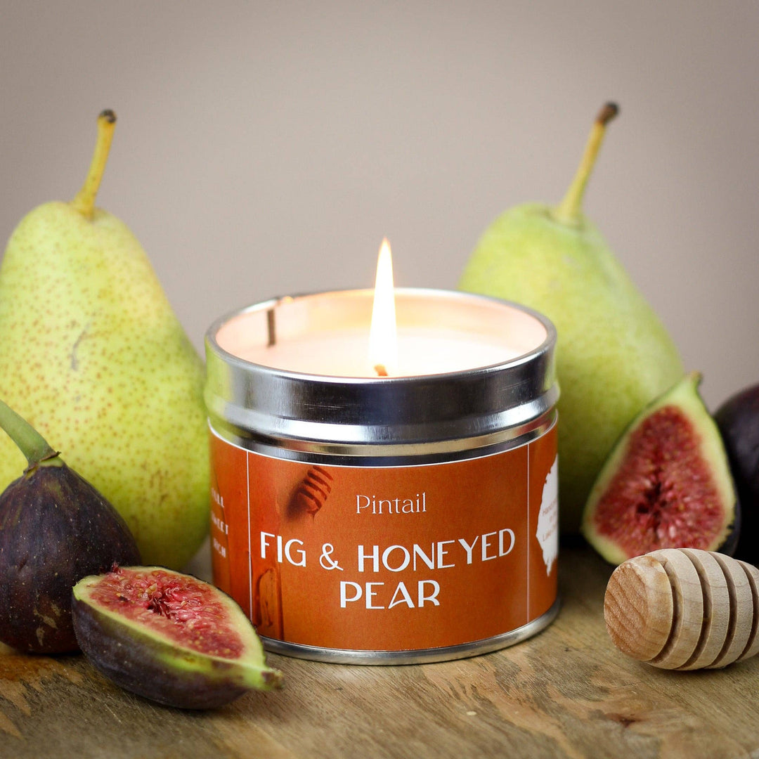 Pintail Fig & Honeyed Pear Classic Tin Candle with fresh figs and pears, available from Source for the Goose in Devon.