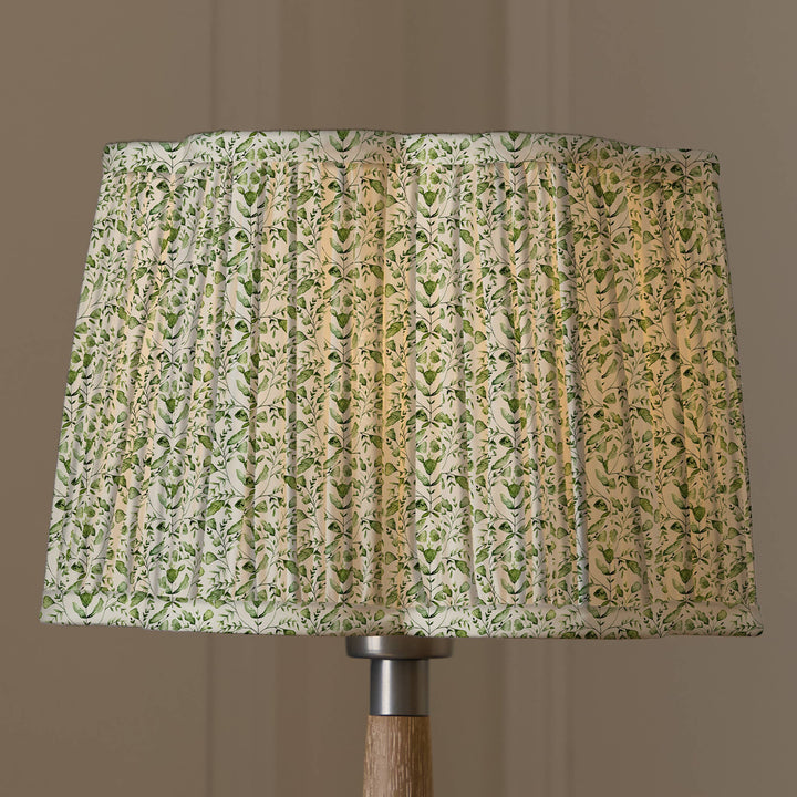 Pleated scalloped lamp shade in sage green with floral watercolor design by Source for the Goose, Devon.