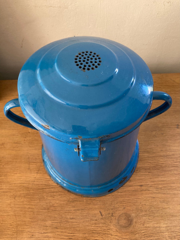 Vintage blue enamel bucket with lid and vent holes, perfect for storage and charming kitchen decor from Source for the Goose, Devon.