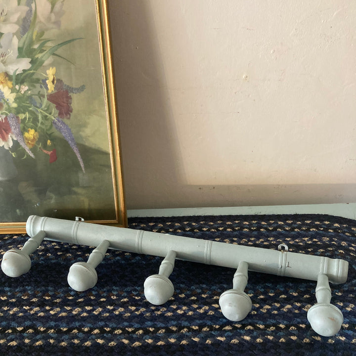 Blue Painted Faux Bamboo Coat Hooks on a rustic wooden rail, perfect for entryways and children's rooms by Source for the Goose, Devon.