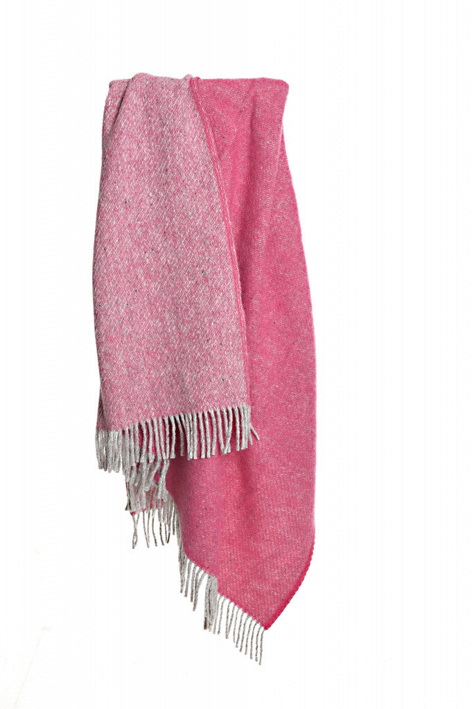 Tweedmill Lifestyle Boa Pure New Wool Blanket in Pink hanging, sourced from Source for the Goose, Devon.