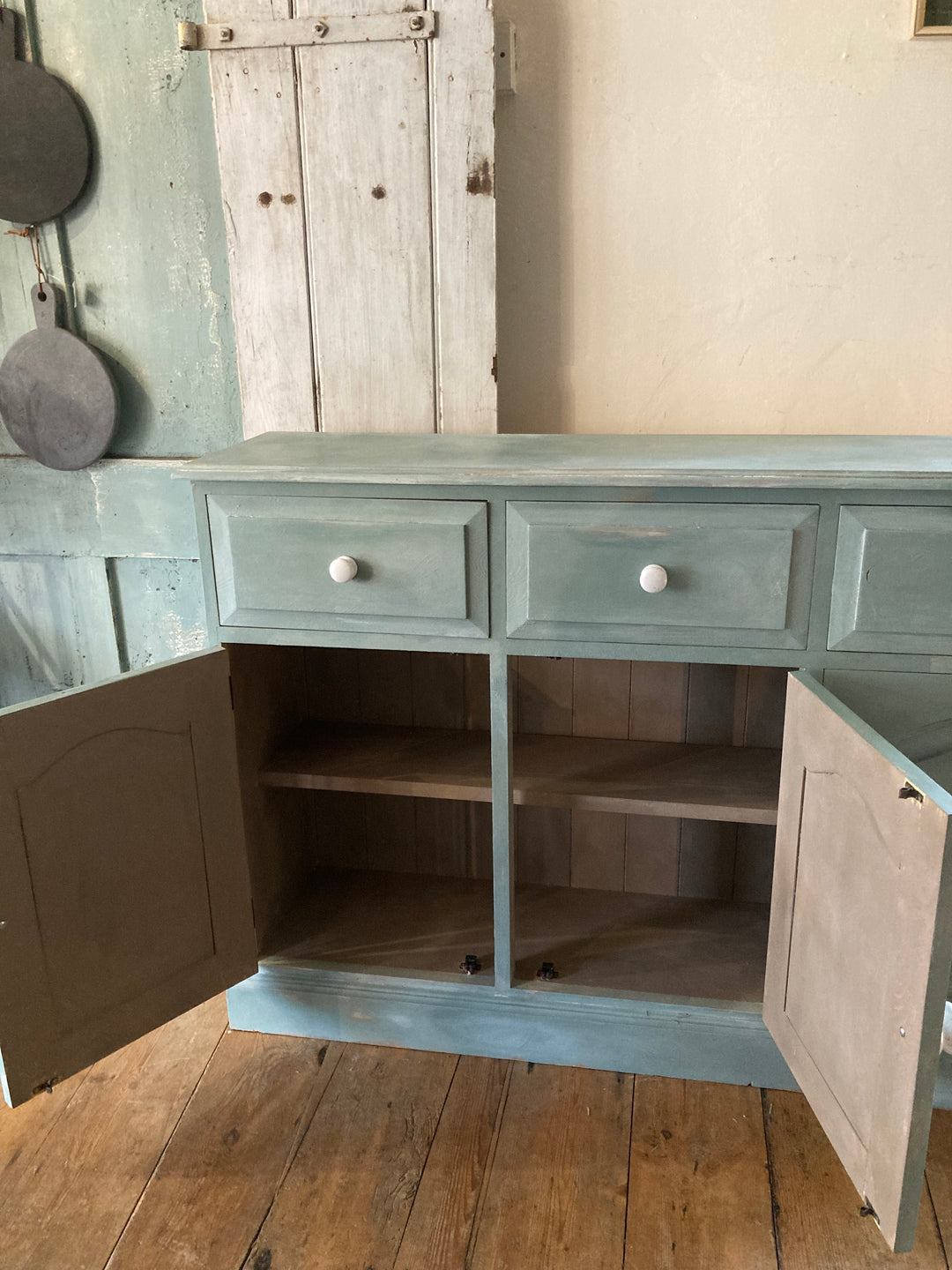 Slim Duck Egg Blue Sideboard with open cupboards and drawers, showcasing vintage charm from Source for the Goose, Devon.