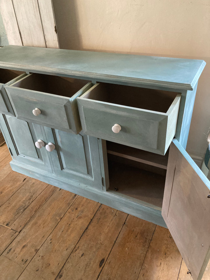 Slim Duck Egg Blue Sideboard with drawers and cupboards, hand-painted for a vintage look. Source for the Goose, Devon.