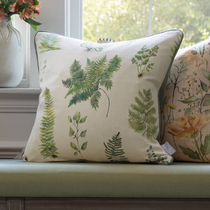 Verbena Printed Piped Cushion with hand-painted fern design, perfect for adding botanical charm to any room decor. Source for the Goose, Devon.