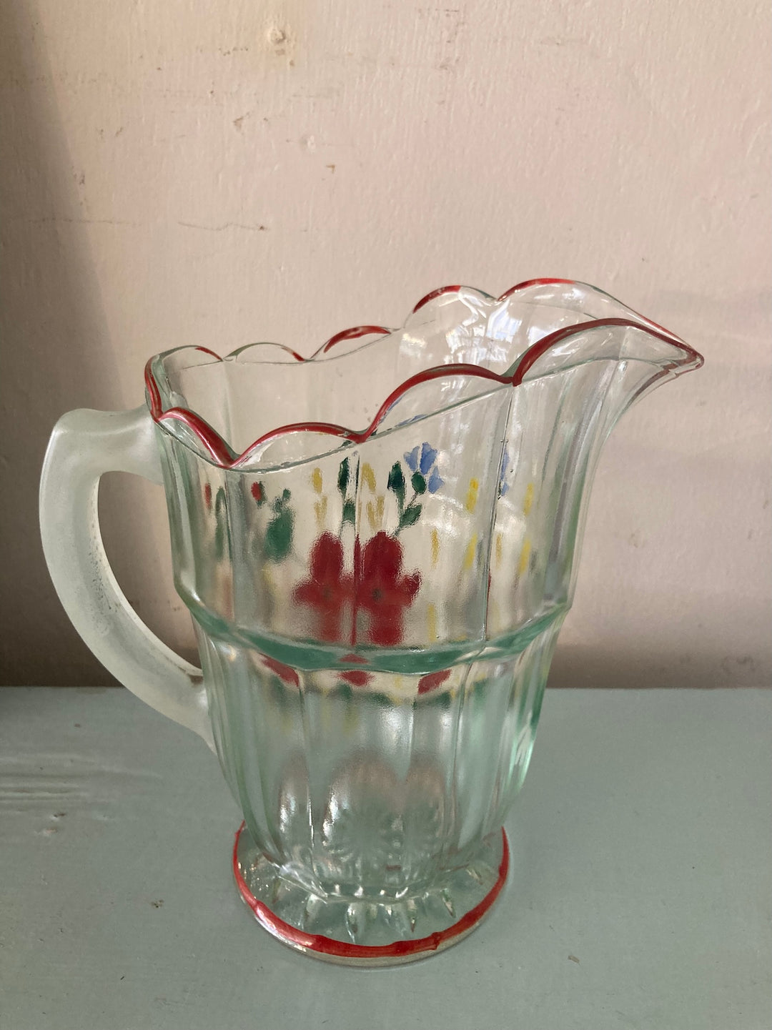 Vintage 1930s painted pressed glass jug with floral design, perfect for summer drinks in Devon.