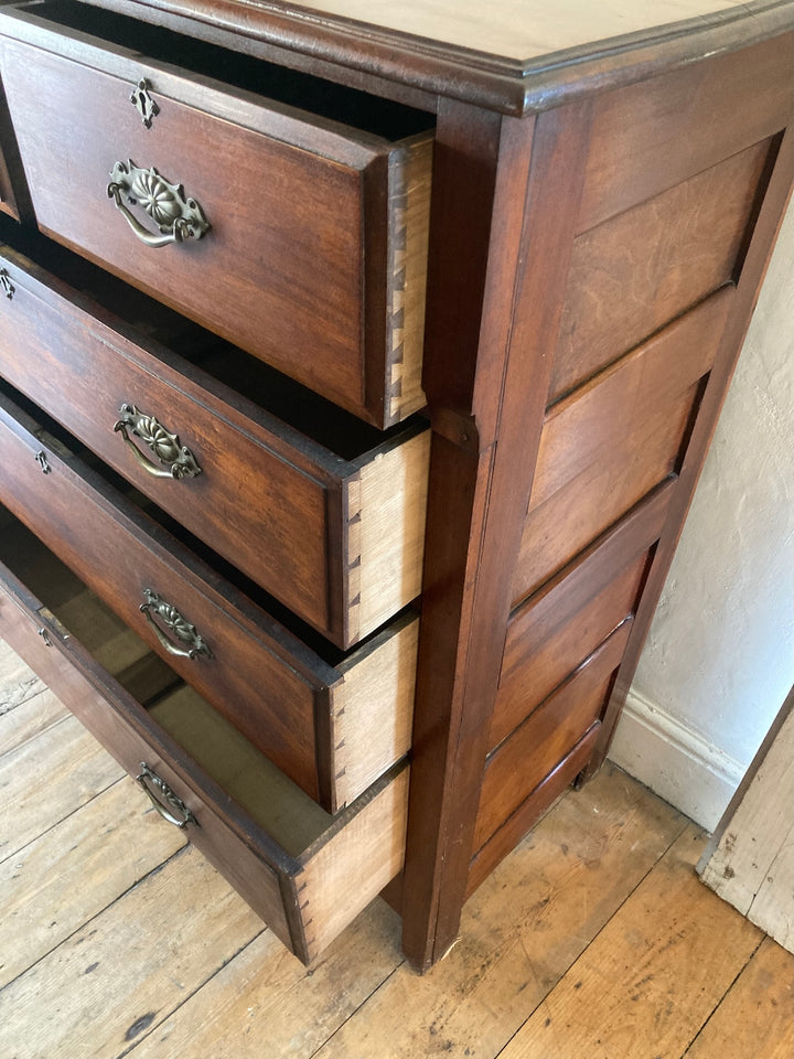 Tall Two over Three Edwardian Chest of Drawers featuring brass handles, showcasing timeless elegance in a Devon home.