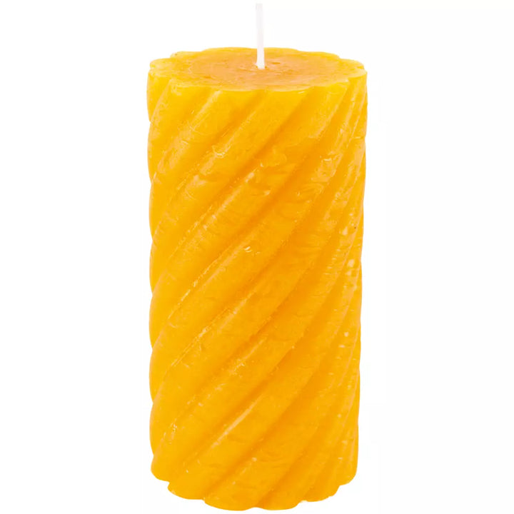 Twisted Warm Ochre Pillar Candle by Source for the Goose Devon, featuring an elegant swirl design and rich yellow color.