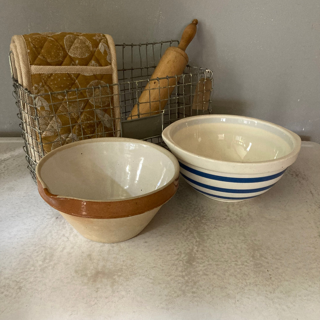 Small French vintage dairy bowl with brown slip edge and classic pouring lip, displayed with kitchenware, by Source for the Goose Devon.